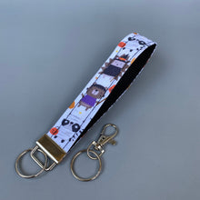 Load image into Gallery viewer, Halloween hedgehog wristlet keychain. Hedgehog keyring.