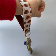 Load image into Gallery viewer, Beige hedgehog wristlet keychain. Hedgehog keyring.