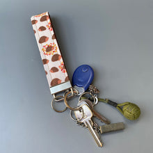 Load image into Gallery viewer, Beige hedgehog wristlet keychain. Hedgehog keyring.