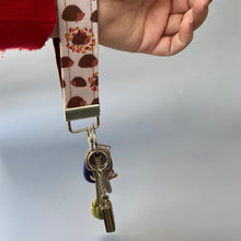 Load image into Gallery viewer, Beige hedgehog wristlet keychain. Hedgehog keyring.