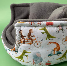 Load image into Gallery viewer, LARGE off the the races cuddle cup. Pet sofa. Guinea pig bed. Fleece pet bed.
