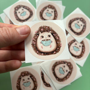 Hot chocolate hedgehog stickers. 51mm x 51mm circle gloss paper sticker.